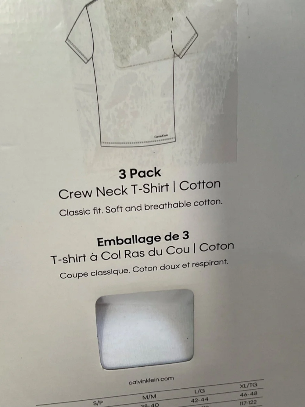 Calvin Klein white tee shirts,new in box.L.